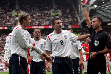 afp - epa00548052 Spanish referee Luis Medina Cantalejo shows England captain David Beckham his second yellow card during the World Cup 2006 qualification match