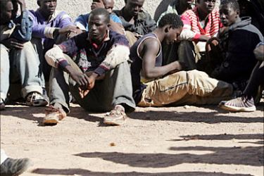 f_African migrants rest inside the Polisirio camp at Bir Lahloo, in Western Sahara 16 October 2005.