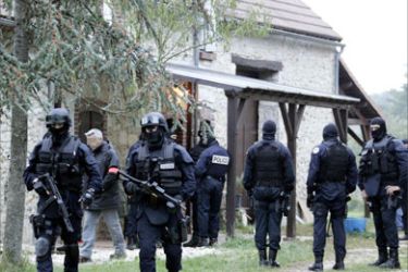 French police raid 03 October 2005 a house in Chateaurenard near Montargis as part of an operation against alleged Islamist extremists, making several arrests notably in the north-central department of Loiret