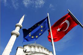 REUTERS/ Flags of Turkey and the European Union raised from the roof of the Covered Bazaar, the city's historical shopping center, flutter over Nuruosmaniye Mosque in the old city of Istanbul