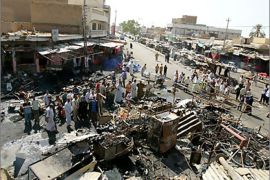 AFP / Iraqis gather the site of a car bomb explosion in the Shiite town of Balad, 70 kilometres (43 miles) north of the Baghdad, 30 September 2005. Some 89 people died and 120 were