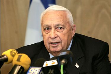 AFP - Israeli Prime Minister Ariel Sharon address his new Kadima or "forward" party during a meeting at the Knesset 28 November 2005 in Jerusalem. Ariel Sharon and Shimon