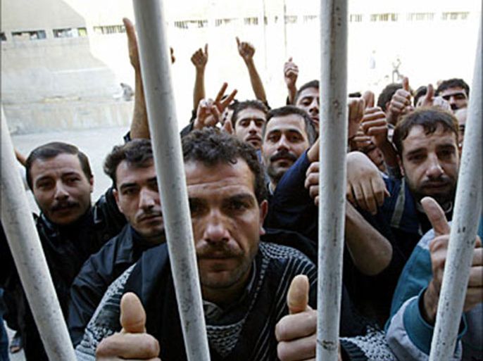 f_Syrian prisoners stage a protest and a hunger strike the central prison in Adra, 15 kms from Damascus