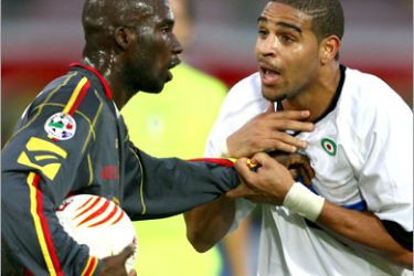 AFP - A picture taken 27 November 2005 shows Inter Milan's Adriano (R) trying to calm down Marco Andre Zoro of Messina after a chorus of monkey chants in the away