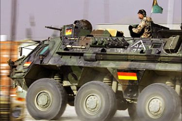 r_A German army Bundeswehr APC drives through ISAF camp 'Warehouse' in Kabul December