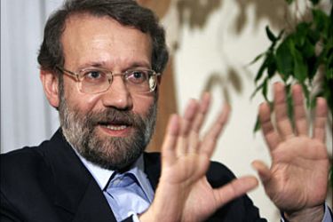 r_Iran's top nuclear negotiator Ali Larijani speaks during a Reuters interview in Tehran December 4, 2005. Iran's patience with Western opposition