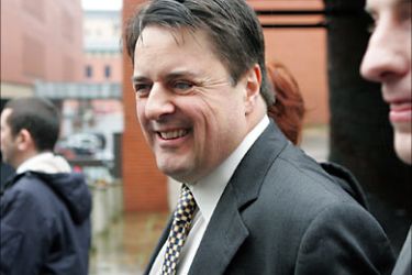 f_British National Party leader Nick Griffin arrives for the start of his race hate trial at Leeds Crown Court in Leeds