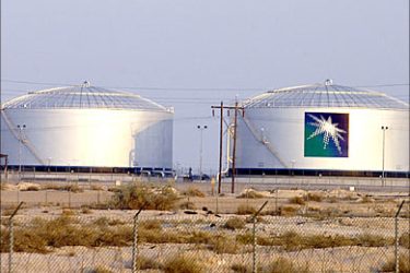 f_A picture shows two oil reservoirs at the oil processing plant of the Saudi state oil giant Aram, in Abqaiq