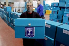 Israeli workers prepare election ballot boxes at the headquarters of the Israeli elections committee near the central Israeli town of Shoham March 16, 2006.