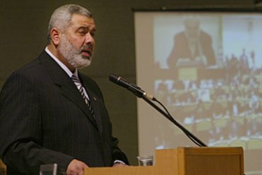 Incoming Palestinian Prime Minister Ismail Haniya addresses the Palestinian parliament to present his cabinet and government agenda for approval in Gaza City 27 March 2006
