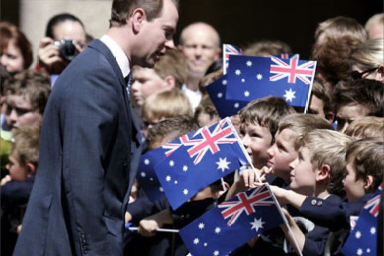 Prince Edward chats with schoolboys before a Commonwealth Day Service at Saint Andrews Cathedral in Sydney March 13, 2006. Queen Elizabeth II of Britain and her husband Prince Philip are in Australia on a five-day official visit, which includes opening the Commonwealth Games in Melbourne