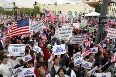 Thousands of people rally in downtown Los Angeles, California for immigrant rights as part of a national `Day of Action," 10 April 2006. Hundreds of thousands of people rallied in cities across the US, calling for dignity and rights for millions of illegal immigrants living and working in the US.
