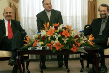 Head of the UN atomic watchdog Mohamed El-Baradei (L) meets with Iran's Chief Nuclear Negotiatior, Ali Larijani (R), in Tehran, 13 April 2006. Iran repeated after talks with El-Baradei that it would not bow to demands it freeze uranium enrichment.