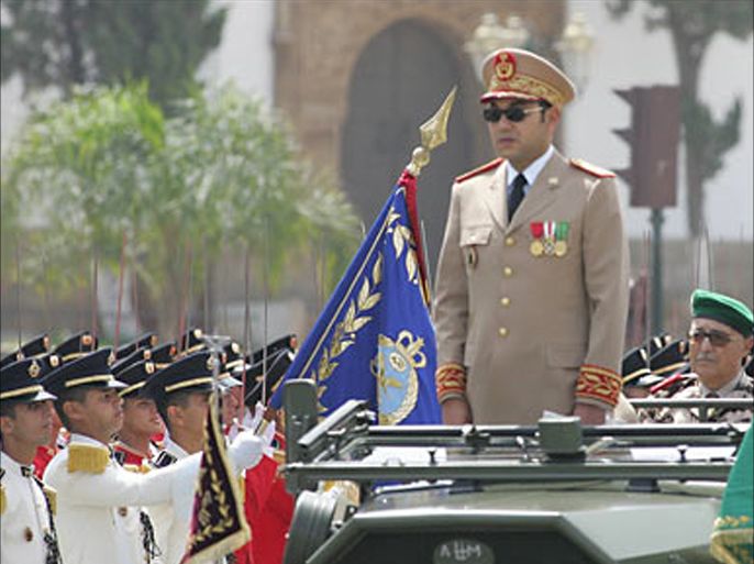 f_Moroccan King Mohammed VI reviews a regiment of the Moroccan army in Rabat 14 May 2006 to celebrate the 50th year of the Moroccan Royal Armed Forces.
