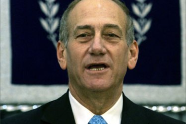 Israeli acting Prime Minister Ehud Olmert is seen during a ceremony at the residence of Israeli president Moshe Katsav to mark Israeli Independence Day in Jerusalem, 03 May 2006