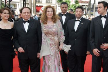 Egyptian director Marwan Hamed (R) arrives with the cast of his film 'Yacoubian Building', Hind Sabry (L), Adel Imam (2ndL), Mohamed Imam (2ndR) and guest at the Festival