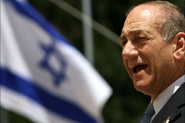 f_Israeli Prime Minister Ehud Olmert participates in a Memorial Day ceremony 02 May 2006 in Jerusalem. In the
