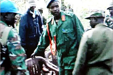 REUTERS/ One of the world's most wanted rebel chiefs Joseph Kony (C) of the Lord's Resistance Army is seen in this image taken from Reuters TV in Nairobi May 24, 2006. Kony has