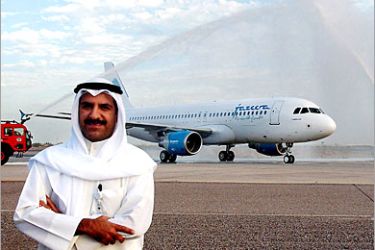 AFP / A handout picture released by Jazeera Airways shows Marwan Budai, Chairman and CEO of Kuwait's Jazeera airways, posing 23 June 2006 for a picture at Kuwait airport near a new Airbus A320. AFP PHOTO/HO/JAZEERA
