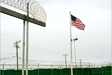 AFP - In this photo reviewed by US military officials, an American flag waves in the front of the maximum security prison Camp 5 at the Guantanamo Bay US Naval Base in Cuba. The Supreme Court this week is expected to rule on the legality of