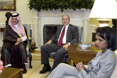 afp - US President George W Bush (C) meets with Foreign Minister of Saudi Arabia Prince Saud al-Faisal and Secretary of State Condolezza Rice