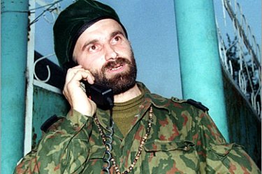 AFP (FILES) File picture taken 15 June 1996 shows Chechen rebel leader Shamil Basayev as he speaks on the phone in the village of Makhety. Chechen rebel warlord Shamil