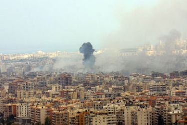 Smoke rises from the southern Beirut suburb of Dahyieh Junubiya, a Hezbollah stronghold, 16 July 2006 following Israeli air raids. The Israeli military ordered all residents