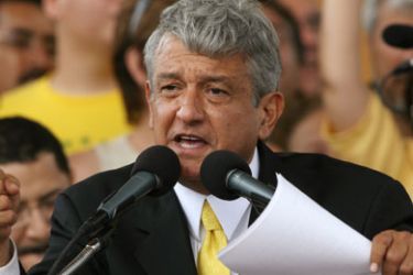 Andres Manuel Lopez Obrador, presidential candidate for the Party of the Democratic Revolution (PRD), speaks at a rally to protest against the result of last weekend's election in Mexico City's Zocalo square July 8, 2006.
