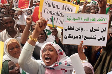 AFP/Demonstrators protest against the "western colonialists", in reference to the US and Britian, who are backing a UN resolution to call for deployment of a UN force in Darfur, outside the UN headquarters in Khartoum, 30 August 2006. Sign in Arabic reads