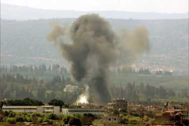 Smoke rises after an Israeli air strike on the outskirts of the southern port city of Tyre (Soure) August 10, 2006.