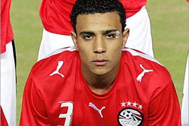 AFP (FILES) Egypt's Mohammad Abdel Wahab poses with his national team before their African Nations Cup (CAN) preliminary game against Ivory Coast 28 January 2006 in