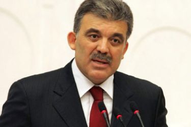 Turkey's Foreign Minister Abdullah Gul (front) addresses the Turkish parliament in Ankara, September 5, 2006, during a debate to vote the decision of the Turkish
