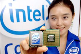 AFP (FILES) In this 27 July, 2006, a South Korean promoter shows Intel's new processor chip "Core 2 Duo" during its launching ceremony in Seoul. Intel, the world's leading
