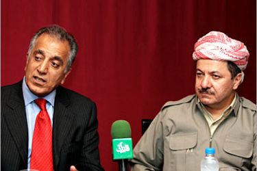 AFP / US Ambassador to Iraq Zalmai Khalilzad (L) speaks during a joint conference with Kurdish leader Massud Barzani (R) in the northern city of Arbil 13 September 2006. Khalilzad urged