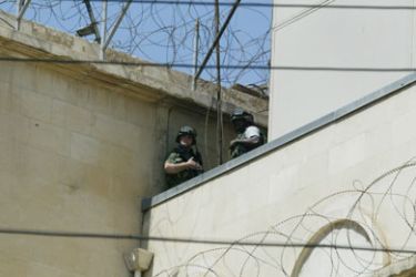 US soldiers guard the US embassy in Damascus 12 September 2006. Gunmen launched a brazen daylight attack on the US embassy in the heart of the Syrian capital today,