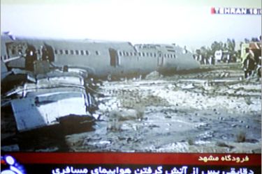 AFP - An image grab from Iran's official television shows the accident scene of an Iranian airliner which caught fire on landing in the northeastern city of Mashhad 01 September