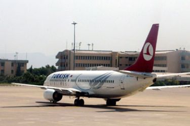 Undated file photo shows a Turkish Airlines Boeing 737-400 at Adnan Menderes Airport in Izmir, similar to the one hijacked by hijackers during a flight from Tirana to Istanbul