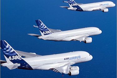 AFP/A handout picutre taken 30 August 2006 shows four Airbus A380 test aircraft fling in formation over Toulouse Blagnac airport on. Deliveries of the Airbus A380 superjumbo jet will be delayed by another year on average, the European Aeronautic Defence and Space Company said