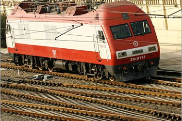 AFP - An electric train leaves Beijing railway station 25 October 2006. Alstom SA of France signed a contract worth 1.2 billion euros (1.5 billion USD) with China's Datong Electric