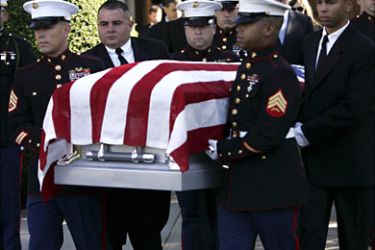 f_The casket of US Marine Sgt. Julian M. Arechaga is brought out from at Our Holy Redeemer Church 21 October 2006 in Freeport, New York. Sgt. Arechaga, 23, was killed 09 October during fighting in Anbar