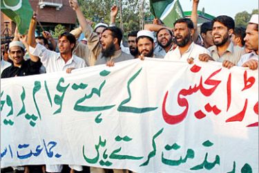 .AFP - Activists of Pakistan's Jamat-i-Islami party shout slogans during a demonstration in Peshawar, 30 October 2006, held to protest an against the army operation in Khar. Pakistani