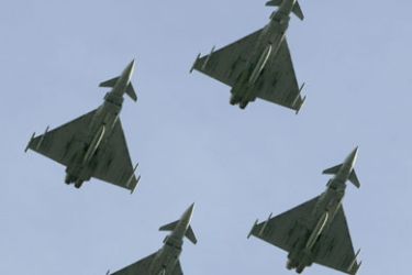 Four British Royal Air Force (RAF) Eurofighter Typhoons perform a fly-past at the annual Lord Mayor's Parade in central London,