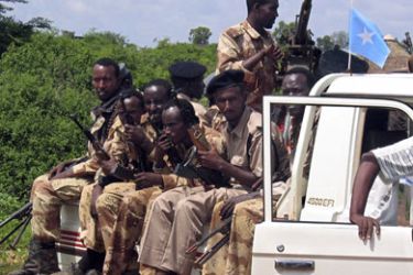 Somalia Transitional Government soldiers keep watch from an armed vehicle over the parliament during U.N. envoy Francois Lonseny Fall's visit, in Baidoa, November 20, 2006.