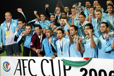 afp - Jordan club Al Faisali players celebrate their AFC final cup win after their match against Bahraini club opponents Muharraq