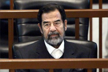 Saddam Hussein sits in court during the continuation of his 'Anfal' genocide trial in Baghdad November 28, 2006. Saddam and six of his former commanders are facing charges of crimes against humanity over a military campaign against ethnic Kurds in the late 1980s.