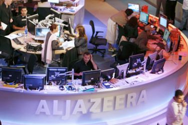 A general view shows the newsroom at the headquarters of the Qatar-based Al-Jazeera satellite channel in Doha 14 November 2006. The English-language version