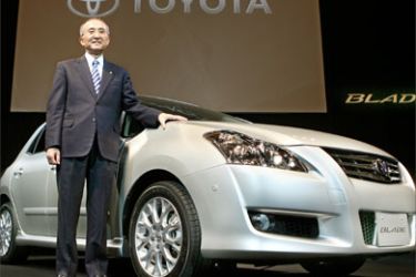 President of Japan's auto giant Toyota motor Katsuaki Watanabe introduces its new compact hatchback "Blade" in Tokyo, 21 December 2006.