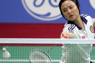AFP/Hong Kong's Wang Chen returns the shuttlecock to compatriot Yip Pui Yin during the women's singles badminton final at the 15th Asian Games in Doha 09 December 2006. EDS NOTE: Corrects Yip's name. AFP PHOTO/Laurent FIEVET