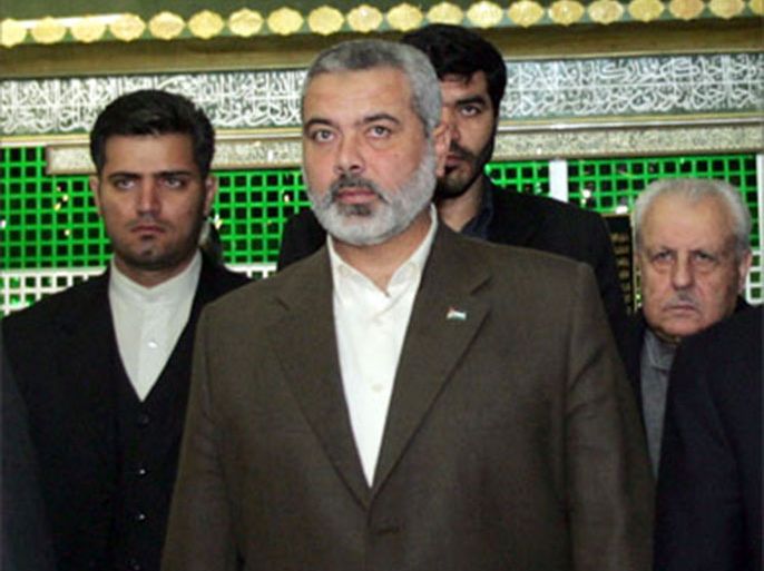 Palestinian Prime Minister Ismail Haniya (C) leaves the mausoleum of the founder of the Islamic republic, the late Ayatollah Ruhollah Khomeini, in Tehran 10 December 2006. Haniya's visit to Iran, as part of a regional tour, comes after the collapse of talks between Hamas and the secular Fatah faction of Palestinian president Mahmoud Abbas on forming a government of national unity and ending the aid blockade.
