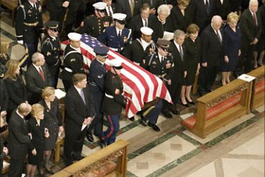 f_An honor guard carries the casket of former President Gerald R. Ford during his funeral at the National Cathedral in Washington, DC, 02 January 2007.